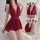 Woman modeling red deep v-neck lingerie sleep dress with sheer fabric and lace waist detail.
