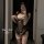 Woman taking a mirror selfie in the pure & playful lingerie for small busts, a seductive no-remove romantic intimate wear set...