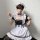 A person wearing a black and white maid costume set, featuring ruffled sleeves, a corset-style bodice, and a full skirt, perf...