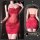 A stunning red lace slip dress featuring intricate floral embroidery, perfect for a night out.