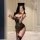 Woman in leopard print lingerie set with cat ears, posing seductively in mirror selfie. pure & seductive cosplay sleepwear fo...