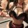 Woman modeling pure temptation lingerie set with leopard print, black fur trim bra and matching panty, plus size seamless des...