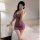 A woman poses in a purple lace chinese-style lingerie set, featuring sheer silk qipao sleepwear with butterfly motifs and tie...