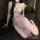 A woman wearing a purple lace sleepwear dress inspired by traditional chinese attire, featuring delicate floral patterns and ...
