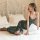 A woman poses elegantly on a bed wearing a qianyu mo silk-look lace bodysuit adorned with intricate chinese-inspired peacock ...