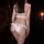Back view of woman in pink sailor-style lingerie set with ruffles, featuring matching top and thong bottom from qingran pure ...