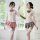 Two women wearing qqny pure allure sleepwear set, featuring elegant sensual lingerie with sheer tops and pleated skirts, perf...