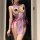 Woman wearing purple qqny silk cheongsam lingerie set with open-crotch bralette, pearl details, and matching robe for romanti...