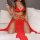 Sexy red lingerie set with gold accents, featuring a deep cleavage top and flowing skirt, perfect for roleplay and bedroom pl...