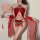 Woman modeling red chinese-style lingerie set with lace, tassels, and sheer sleeves, holding a decorative fan.