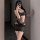 Woman wearing a seductive lace bodysuit, featuring an open-crotch design and playful maid costume elements, perfect for date ...