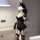 Seductive lace lingerie set featuring sheer mesh bodysuit and garter stockings, perfect for women seeking allure and elegance...