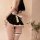 Seductive maid costume lingerie set with black dress, white bow, and garter—modest yet tempting sleepwear for women.