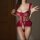 Woman modeling red lace bodysuit with open-crotch design and ruffled waist.