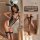 Woman modeling sexy bunny girl bodysuit with cut-outs, sheer mesh, and fishnet stockings. includes ears, collar, cuffs, and t...