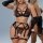 Sexy black lace lingerie set with see-through straps and bondage-style details for couples.