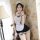Woman wearing a sexy maid costume set with lace lingerie, apron, and headband for seductive role play.