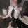 Woman wearing a sexy secretary costume set with a revealing white top and black skirt, styled for seductive lingerie sleepwea...
