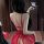 Woman in red lace lingerie set with open back, featuring no-remove bra and matching outfit for all sizes.