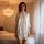 Elegant white silk-robe with lace detailing, perfect for women seeking sexy yet sophisticated sleepwear or bathrobe. ideal us...
