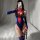 Woman in sexy spider-man cosplay bodysuit with open-crotch design, blue and red tight-fit anime-inspired lingerie for role pl...