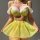 Woman wearing yellow lace bra and floral mesh mini skirt from temu pure & playful lingerie set, playful roleplay style.
