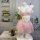 Pink floral mesh mini skirt lingerie set with lace bra and tulle overlay, displayed on mannequin for playful roleplay.