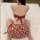 Vintage floral print sexy halter top bodysuit, retro allure lingerie for women, elegant design with bow detail.