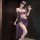 Elegant purple sensual lingerie set featuring a sparkling mesh bralette with lace detailing and matching bottoms, perfect for...