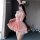 A woman poses in a festive bunny-themed red velvet costume, perfect for christmas cosplay or new year celebrations. the outfi...