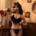 Sexy black maid costume with feathered bow and stockings, perfect for small bust women seeking bold allure and playful elegan...