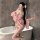 A woman poses by a bathtub wearing a yasisei cosplay lingerie set, featuring a pink kimono robe with floral patterns, an open...